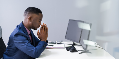 Praying at your desk.