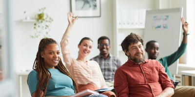 Hands raised in class